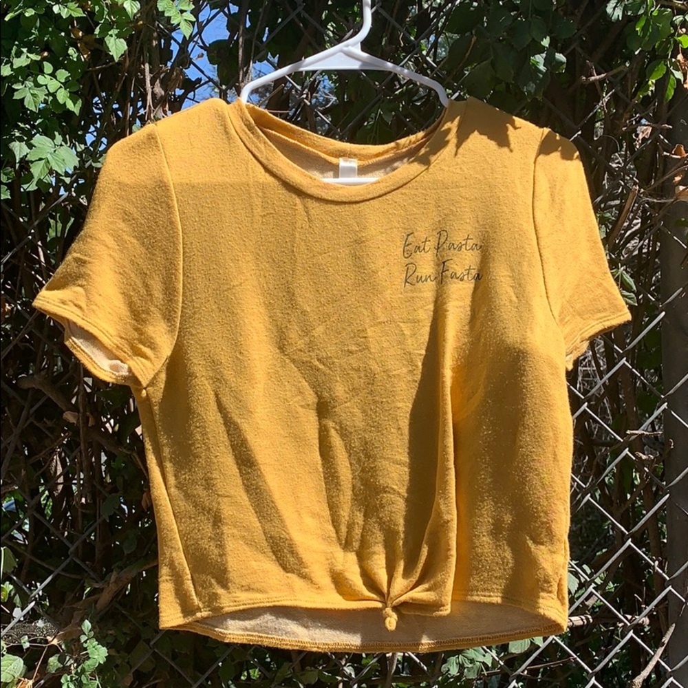 a yellow crop top